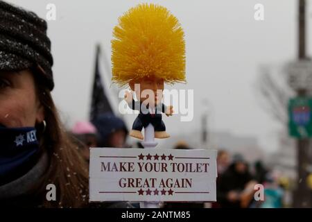 Philadelphia, PA, USA - January 18, 2020: A Donald Trump-shaped toilet brush is seen at the fourth annual Women's March on Philadelphia. Stock Photo
