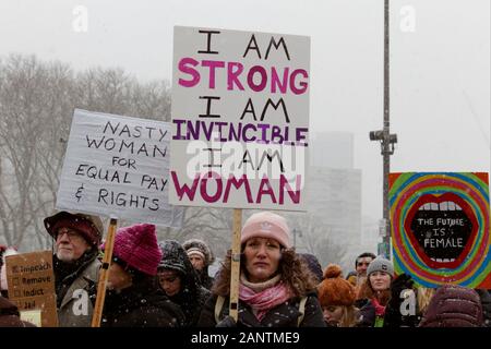 Philadelphia, PA, USA - January 18, 2020: Hundreds brave a snowstorm for the fourth annual Women's March on Philadelphia. Stock Photo