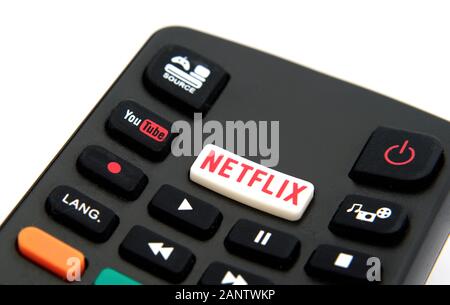 Netflix and YouTube buttons on the remote control from Hitachi Smart TV. Stock Photo