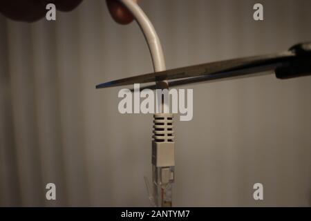 Concept Isolated Photo Of Cutting Cable Cord Stock Photo