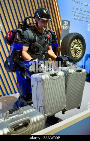 Demonstration of strength of Sarcos Guardian XO full-body powered exoskeleton, soon to be used by Delta Airlines for baggage, at CES, Las Vegas, USA Stock Photo