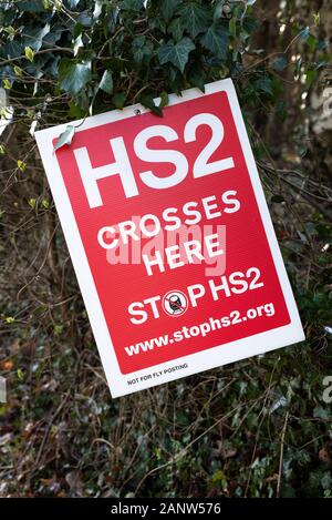 Wendover, Buckinghamshire, UK.18th January 2020. Determined campaigners opposing HS2 recently established the Wendover Active Resistance Camp in woodland south of Wendover adjacent to the the A413. The camp is in the path of the proposed HS2 rail line where it would cross the A413. The Wendover Active Resistance Camp intend to occupy their site for as long as possible, opposing the construction of the HS2 rail line. Placards warn passing motorists that the HS2 rail line will cross here, and a banner indicates HS2 will be stopped here. Credit: Stephen Bell/Alamy