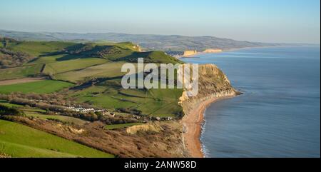 Jurassic Coast, Dorset, UK. 19th January 2020: An afternoon of glorious sunshine and crisp blue skies on the Jurassic Coast. After weeks of heavy rain and high winds, the stunning West Dorset coastline is bathed in winter sunshine on a bright and chilly winters day.  View of the Jurassic coast from Golden Cap looking out over West Bay and Portland. Golden Cap. Credit: Celia McMahon/Alamy Live News. Stock Photo