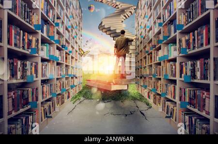 New hidden world behind the library. Books open the mind for imagination Stock Photo