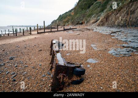 Trolly used at a former RAF Bloodhound missile base marooned on the nearby beach by coastal erosion. Stock Photo