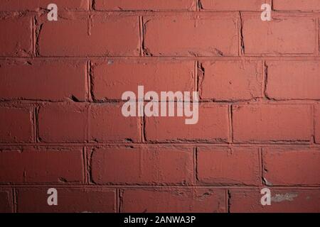 Maroon brick wall texture. Stock photo brick wall in burgundy color. Stock Photo