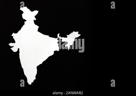Head-on shot of Indian Map of white color on a black background, Paper cut-out of indian map with copy space, 26 January republic day or 15 August ind Stock Photo