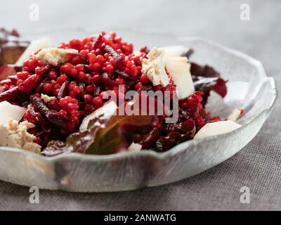 Shoestring Beets with Pearl Couscous and Pears Stock Photo