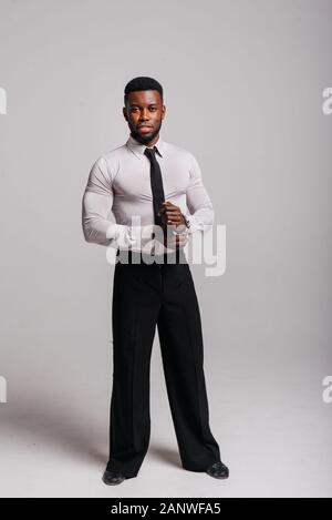 Happy confident young african american business male smiling with confidence, executive stylish company leader. Portrait of an businessman wearing Stock Photo