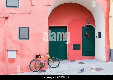 Procida (Italy) - Colored walls and bike in Procida, a little island in Campania, southern Italy Stock Photo