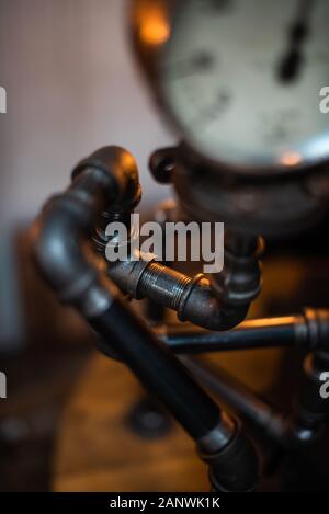 Close up detail of old water valve, shallow depth of field dark antique vintage pressure system space for advertising concept crazy abstract unique Stock Photo