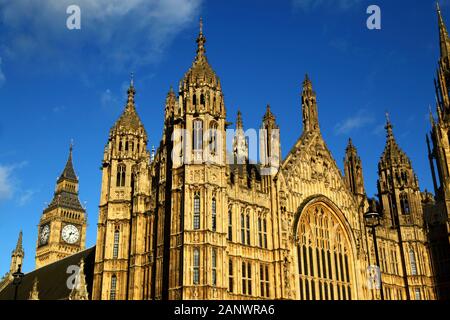 South window and towers overlooking Old Palace Yard, Big Ben clock tower in left background, Palace of Westminster / Houses of Parliament, London, Eng Stock Photo