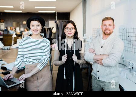 Colleagues in tailoring studio Stock Photo