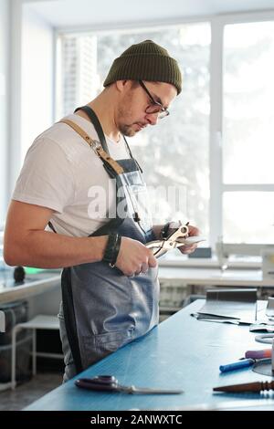 Using rotary punch Stock Photo