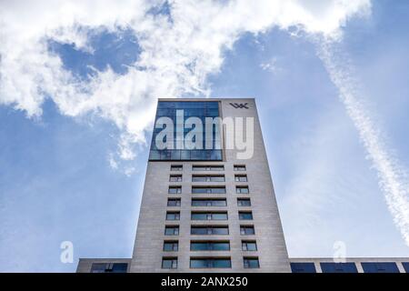 Berlin, Germany - May 30, 2019: The skyscraper Zoofenster is rising towards the blue sky. The emblem of Waldorf Astoria is mounted on the facade as it Stock Photo