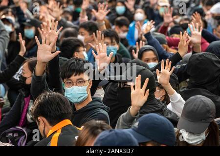 Hong Kong. January 19, 2020, Hong Kong, Hong Kong, Hong Kong, China: What started as a peaceful demonstration in Chater Garden, quickly eroded into chaos. Protesters Began their march east toward Causeway Bay, chanting there demands. Shortly after their march began they were soon confronted by a wall of police. Within minutes the peaceful march exploded into mayhem. Police blanketed the area with tear gas, dividing the crowd and sending protesters scattering. Credit: ZUMA Press, Inc./Alamy Live News Stock Photo