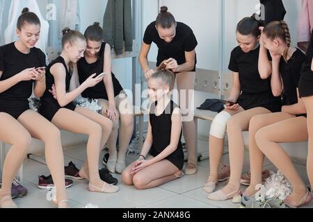 Preparing for cheerleading training Stock Photo