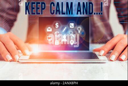 Conceptual hand writing showing Keep Calm And. Concept meaning motivational poster produced by British government Stock Photo