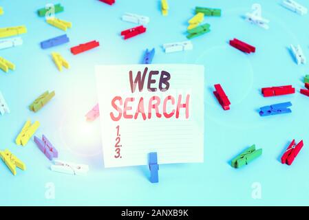 Word writing text Web Search. Business photo showcasing software system designed to search for information on the web Colored clothespin papers empty Stock Photo