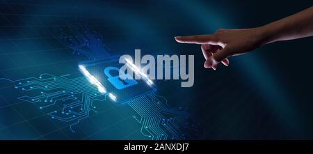 Cyber security data protection business technology privacy concept. Young businessman  select the icon security on the virtual display Stock Photo