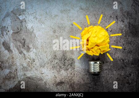 Great idea concept with crumpled yellow paper light bulb Stock Photo