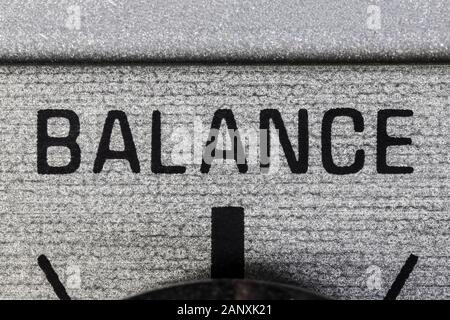 Close up macro photograph of balance control dial on vintage boombox stereo. Stock Photo