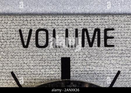 Closeup macro photograph of volume dial on vintage boombox stereo. Stock Photo