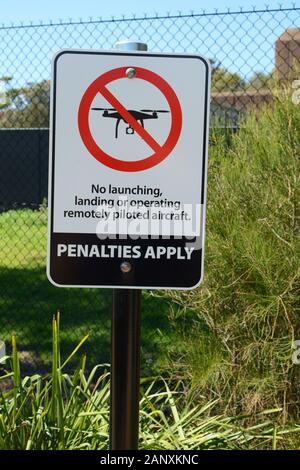 No drones sign in Australia prohibiting launching, landing, or operating remotely piloted aircraft Stock Photo