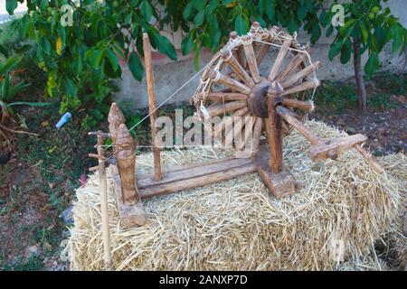 spinning wheel. old manual yarn rewinding machine Stock Photo