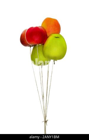 Red and green apples in the form of a bunch of balloons on a white background isolated Stock Photo