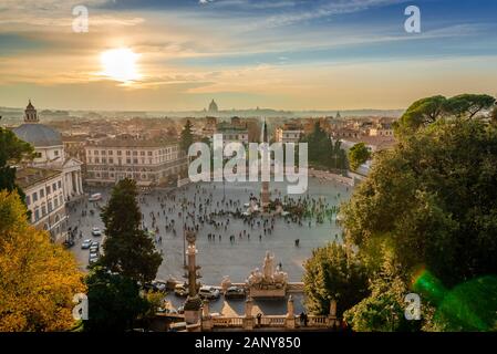 View of Piazza del Popolo in Rome, in the evening, with the Vatican Dome in the background. Photo taken from Terrazza del Pincio Stock Photo