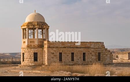 an ancient franciscan catholic chapel being restored near the baptismal site on the jordan river with a byzantine era monastery in the background Stock Photo