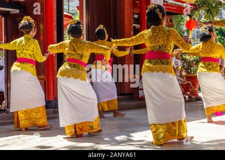 Traditional ceremonial dancing at Vihara Dharmayana - Chinese Buddhist temple (Kongco Kuta or Kongco Leng Gwan Kuta) in Kuta, Bali, Indonesia. Stock Photo