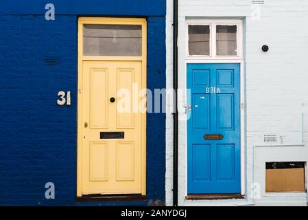 London, UK - May 15, 2019: Colorful house doors in St lukes mews alley near Portobello Road in Notting Hill Stock Photo