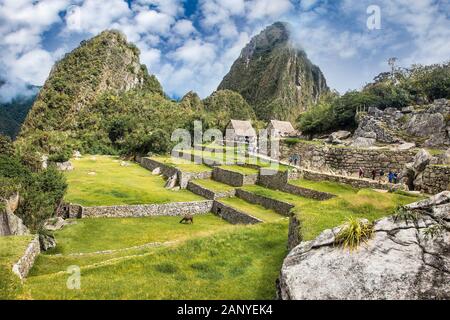 Machu Picchu Pueblo,  Peru - Jan 8, 2019:   Panoramic view on Ancient city of Machu Picchu in Peru. South America. Stock Photo