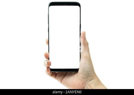 Woman hand holding black mobile phone with white screen at the background, smartphone blank screen Stock Photo