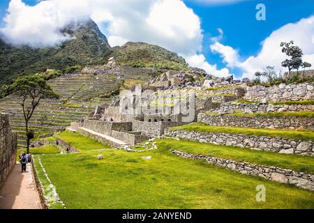 Machu Picchu Pueblo,  Peru - Jan 7, 2019:   Panoramic view on Ancient city of Machu Picchu in Peru. South America. Stock Photo