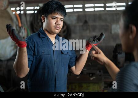 Independent business owner scolded by angry customer about quality of work - Emotional female client angry and upset with business standards, submitting negative satisfaction feedback to manager Stock Photo