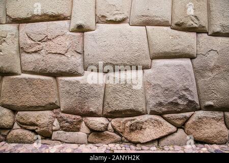 Incredible Inca Wall on Hatun Rumiyoc Street, Famous Ancient Street in Cusco, Peru, South America, Archaeological site. Stock Photo