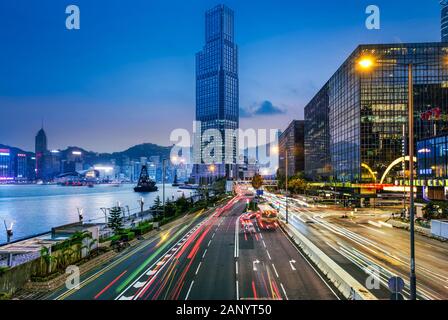 Hong Kong - February 20. 2018 : Salisbury Road towards Tsim Sha Tsui, with the InterContinental Hong Kong Hotel, in the background the Skyline of Hong Stock Photo