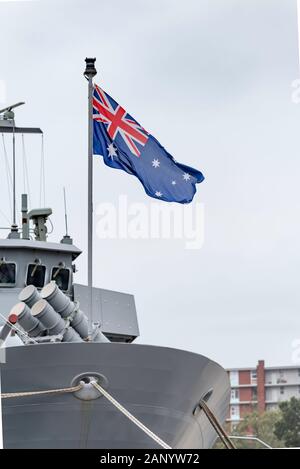 Australian navy ship HMAS Stuart (FFH 153) moored in Sydney, Australia, is an Anzac Class Frigate and is flying the Australian flag or Blue Ensign. Stock Photo