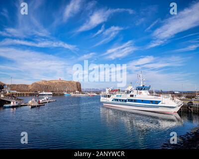 16 April 2018: Stykkisholmur, Iceland - Boats moored in the harbour at Stykkisholmur, on the Snaefellsnes Peninsula, West Iceland. Stock Photo