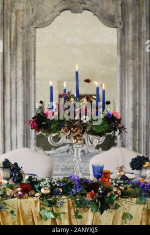Colourful wedding reception tablescape. Stock Photo