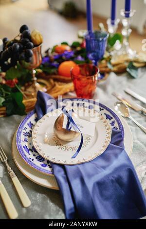 Colourful wedding reception tablescape. Stock Photo