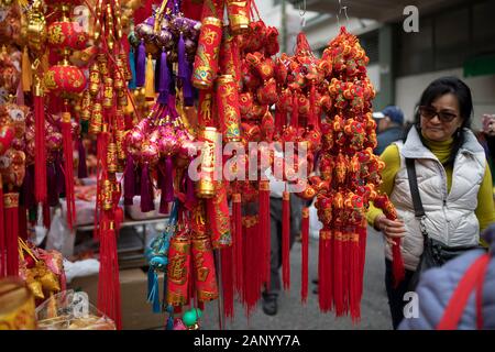 San Francisco, USA. 19th Jan, 2020. People visit a Spring Festival fair at the Chinatown in San Francisco, the United States, Jan. 19, 2020. The annual Spring Festival fair features a variety of small gifts, good-luck new year items, potted flowers as well as Chinese folk performances. Credit: Li Jianguo/Xinhua/Alamy Live News Stock Photo