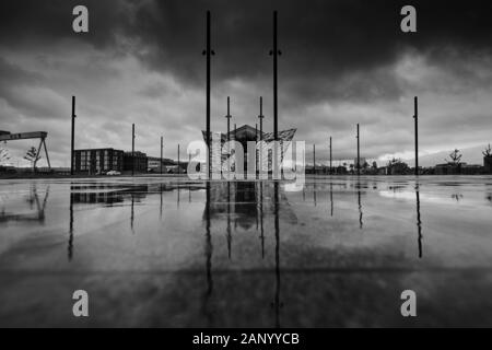 Titanic Belfast reflected in the Olympic yard, Belfast, Northern Ireland Stock Photo