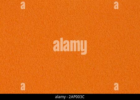 Saturated orange foam EVA texture with simple surface. High quality texture. Stock Photo