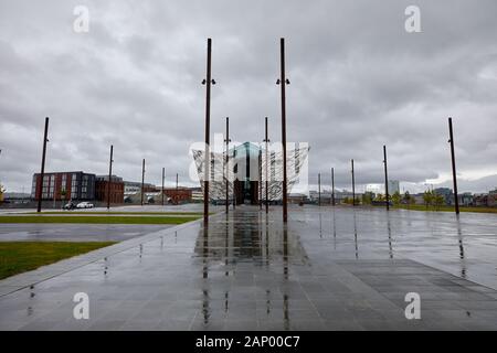 Titanic Belfast reflected in the Olympic yard, Belfast, Northern Ireland Stock Photo