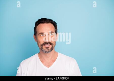 Close-up portrait of his he nice attractive curious genius cheerful dreamy guy freelancer thinking creating new idea isolated over bright vivid shine Stock Photo