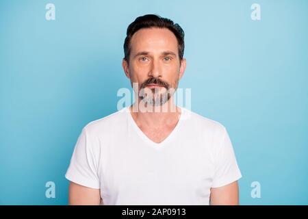 Close-up portrait of his he nice attractive content brunet guy qualified tech IT geek expert programmer isolated over bright vivid shine vibrant teal Stock Photo